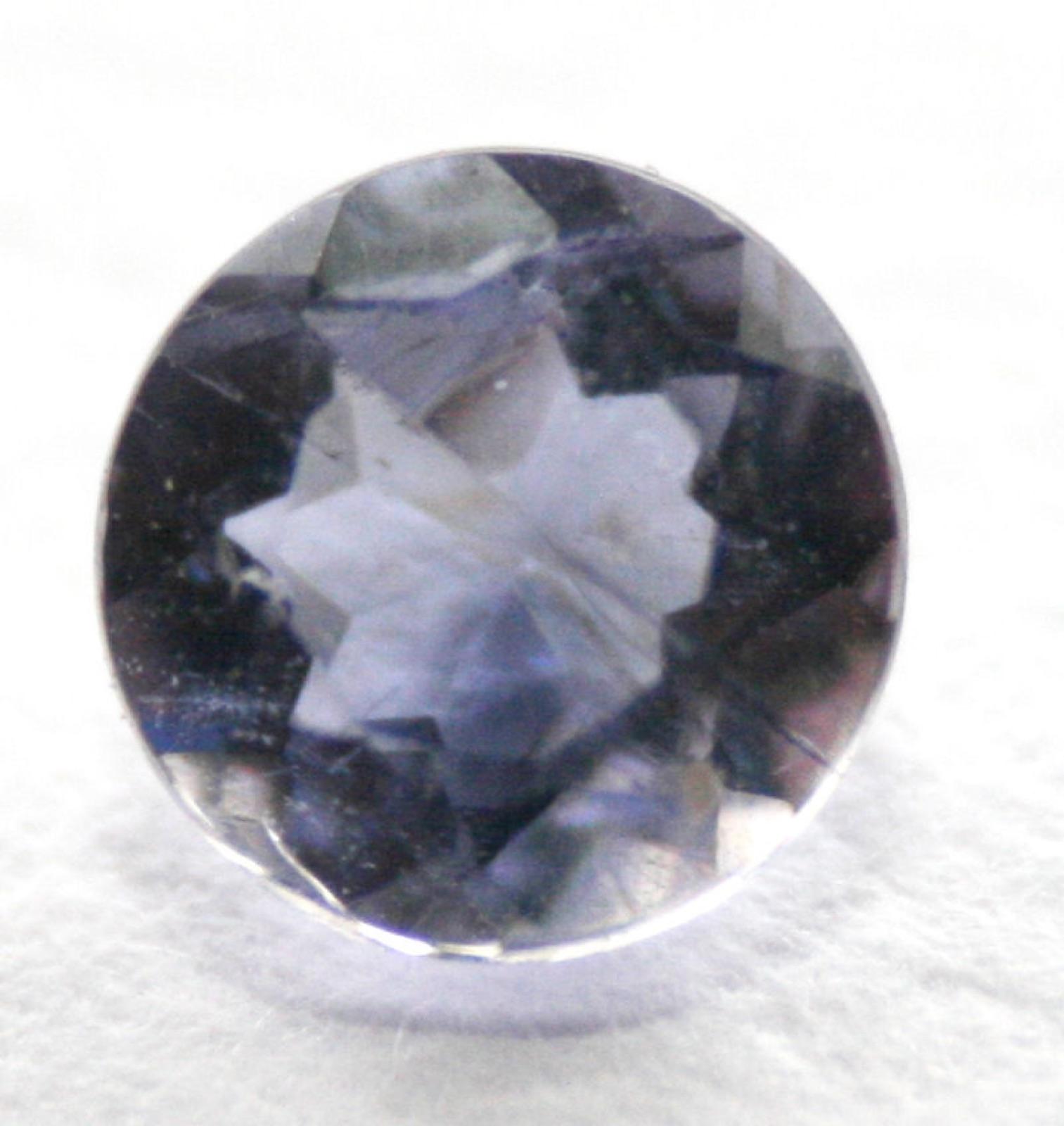 Faceted iolite showing the violet-blue that cordierite gives down one crystal axis