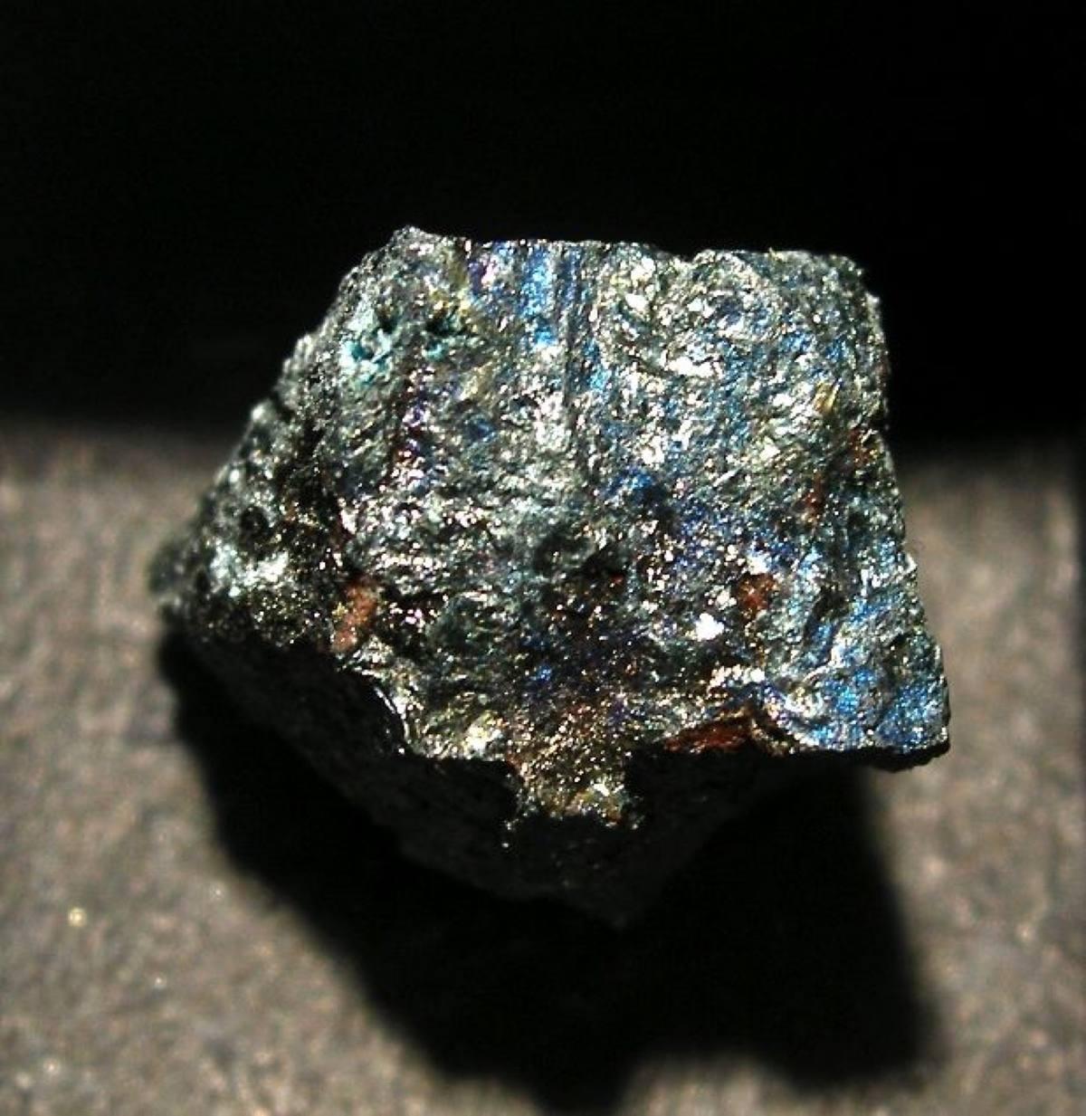 Metallic blue-green keyite crystal