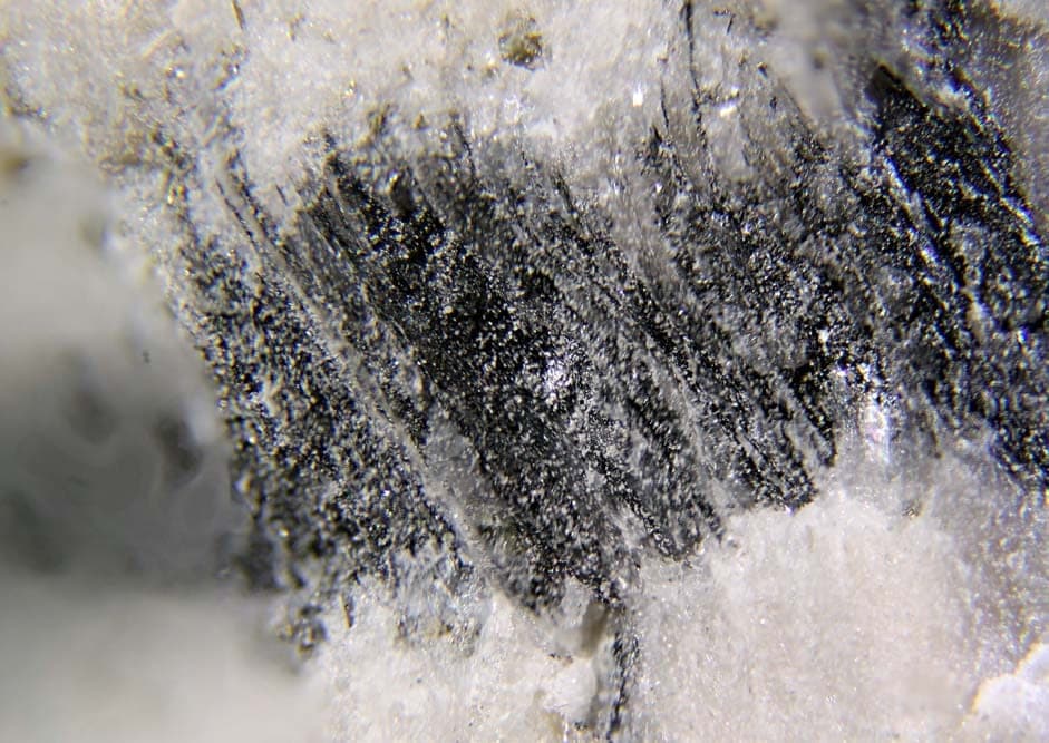 Pellouxite mineral