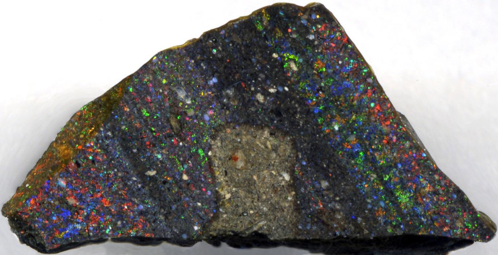 Precious opal still in its basalt host rock, the way it comes out of the ground
