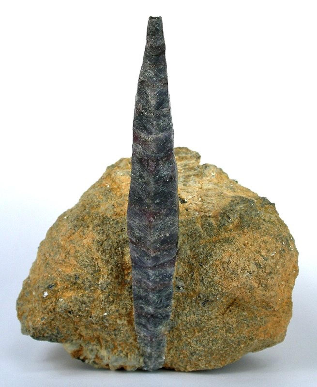 Sapphire crystal in its host rock