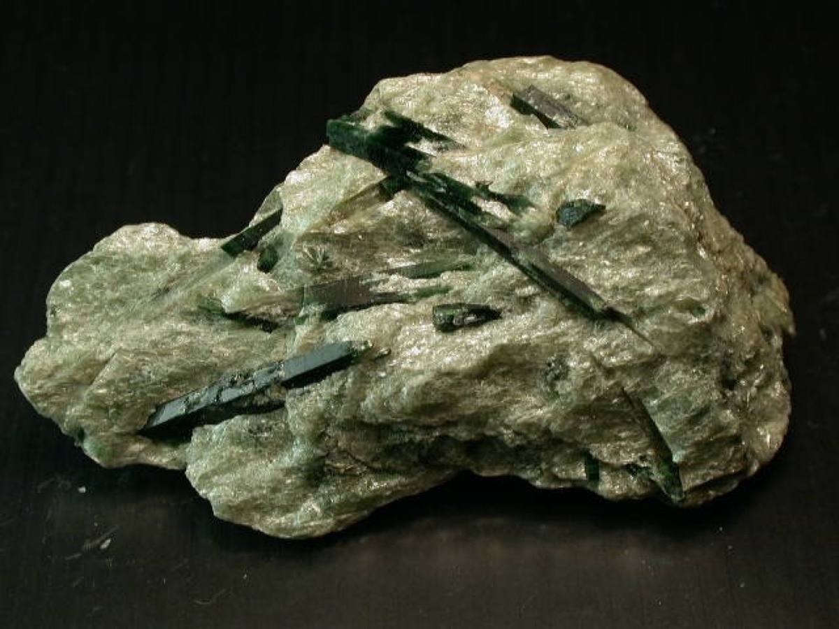 Slender dark green actinolite prisms in mica schist, Chelan County, Washington