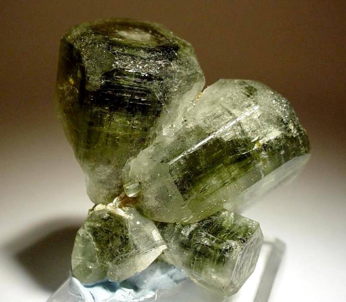 Olive to pale green barrel-shaped apatite crystals