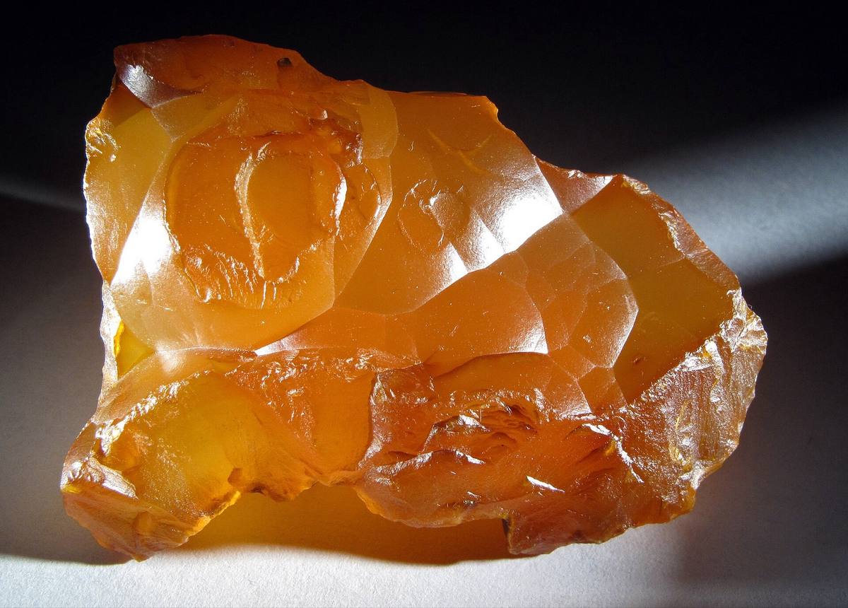 Backlit carnelian rough showing red-orange translucency, New Jersey