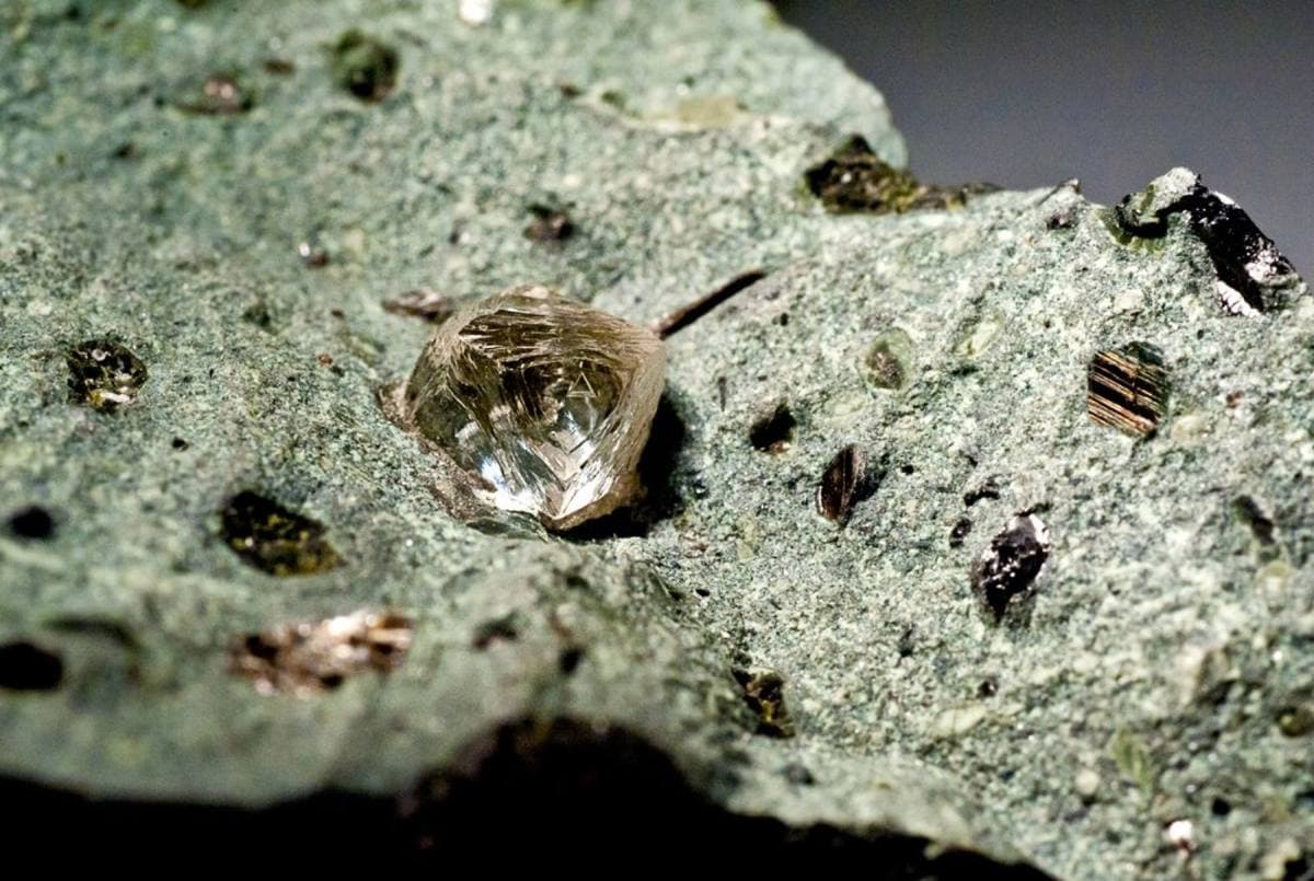 Diamond crystal in green kimberlite matrix