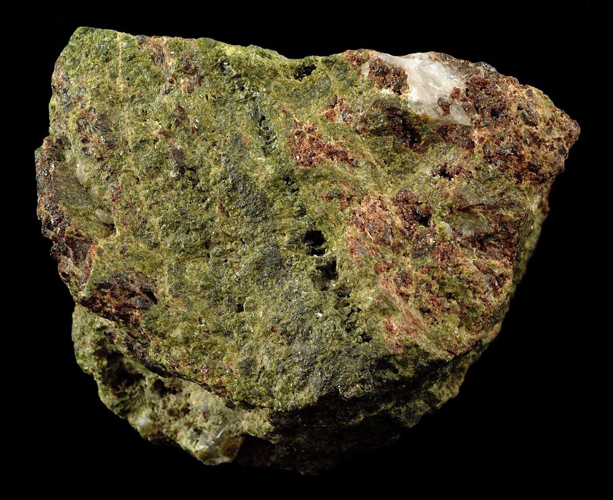 Massive pistachio-green epidote in skarn with garnet
