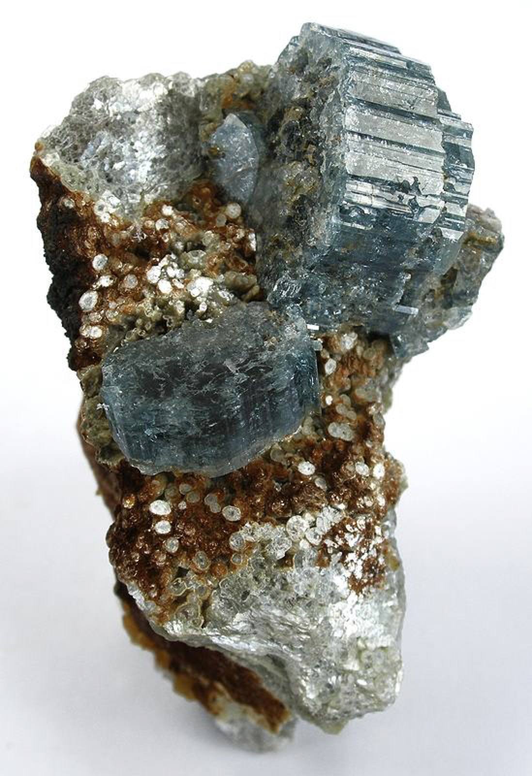 Blue-green fluorapatite prisms, Emmons Quarry, Maine