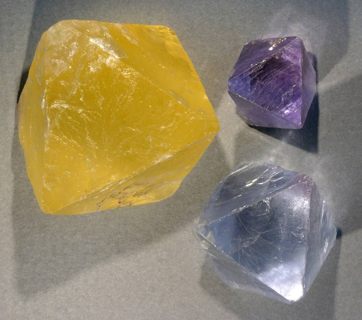 Cleaved fluorite octahedra showing perfect octahedral cleavage