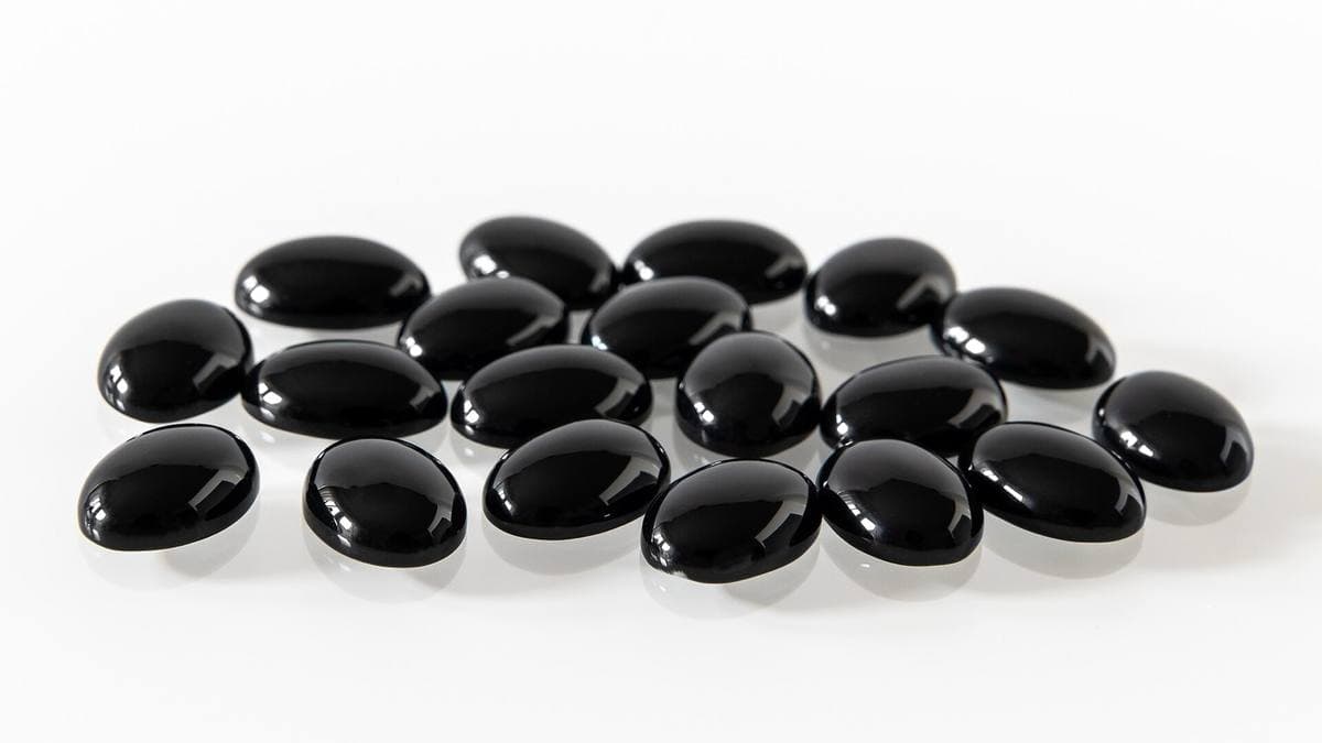 Polished black onyx cabochons