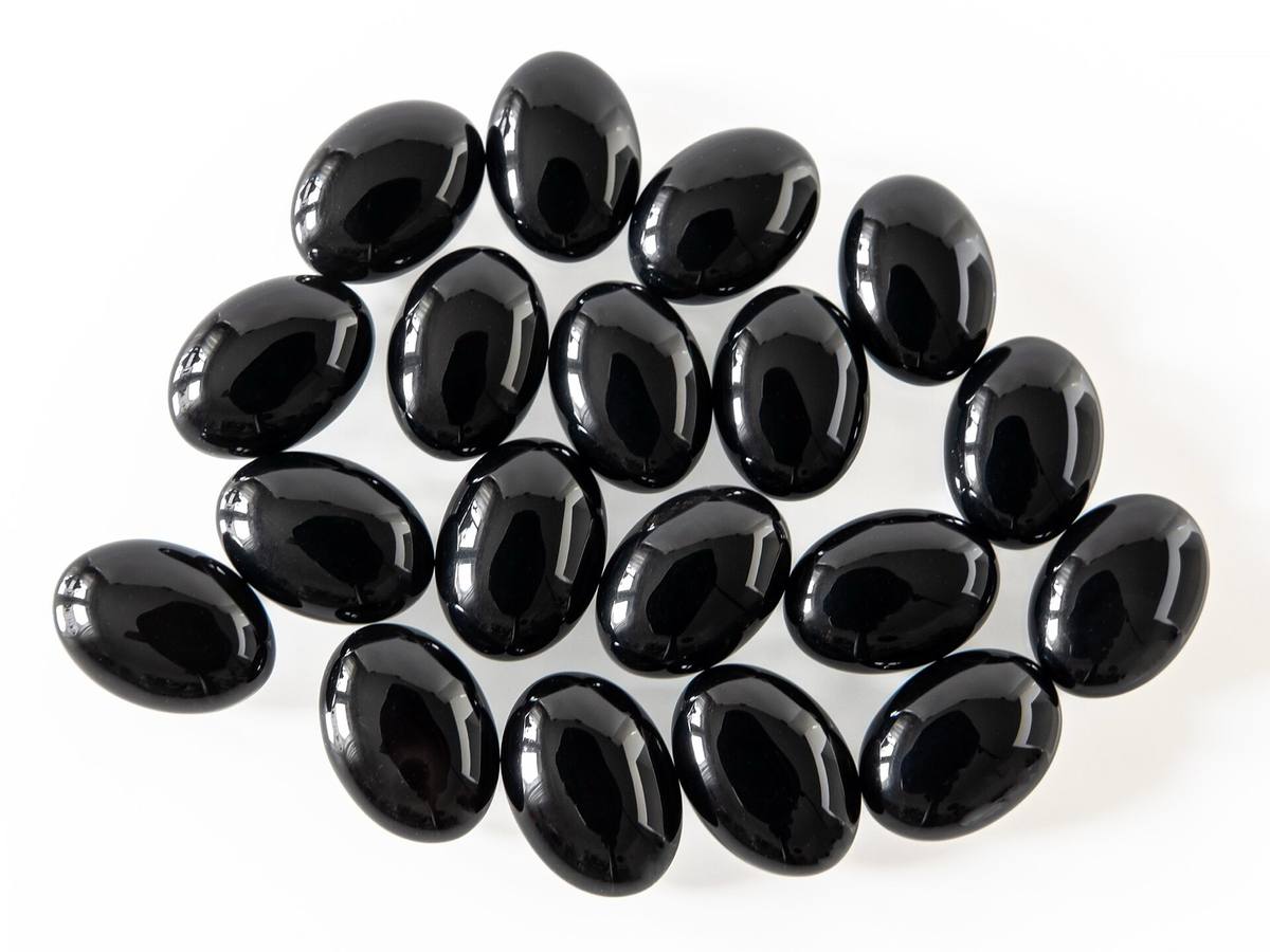 Black onyx cabochons cut from banded chalcedony