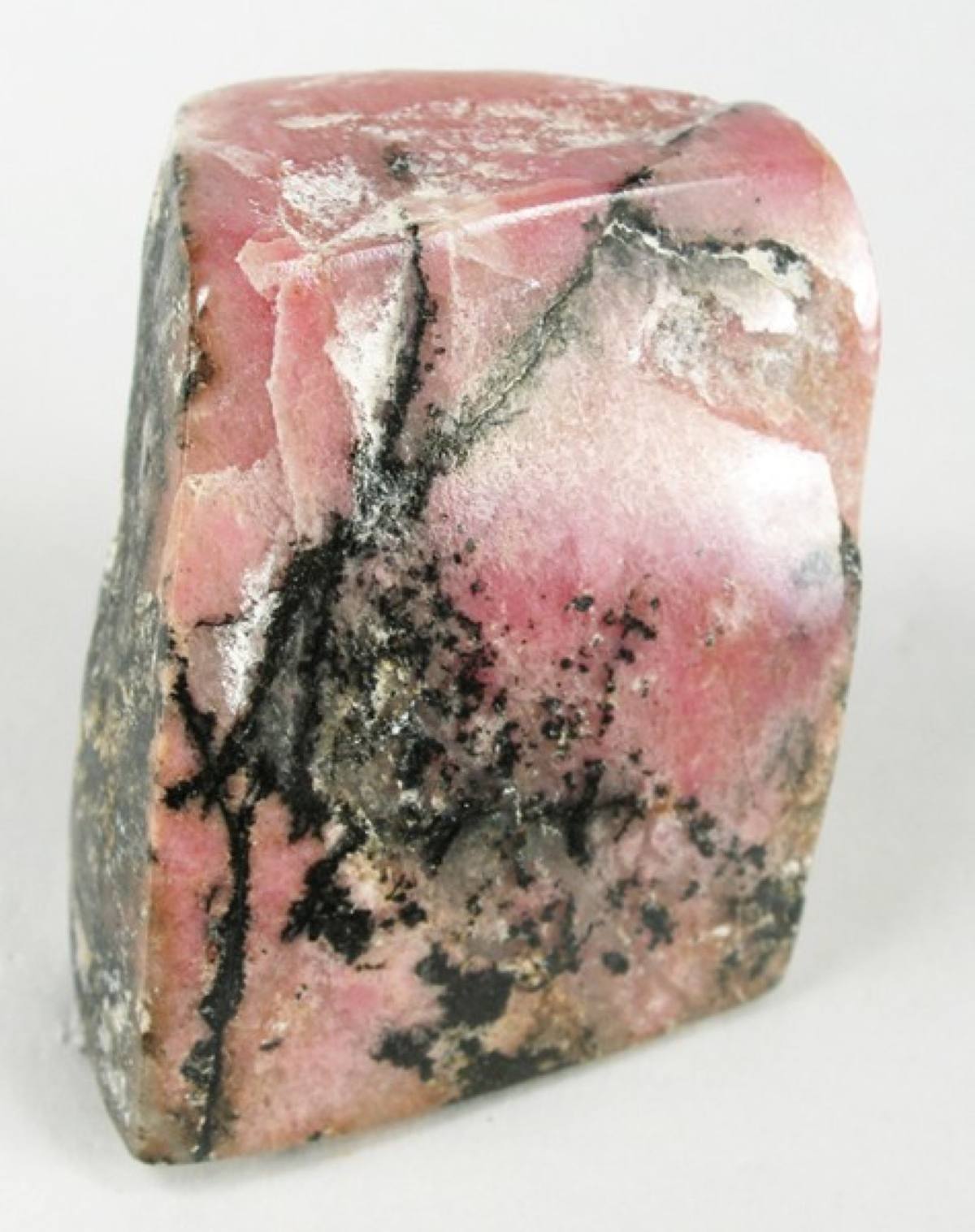 Rose-pink rhodonite with black manganese-oxide veining, California