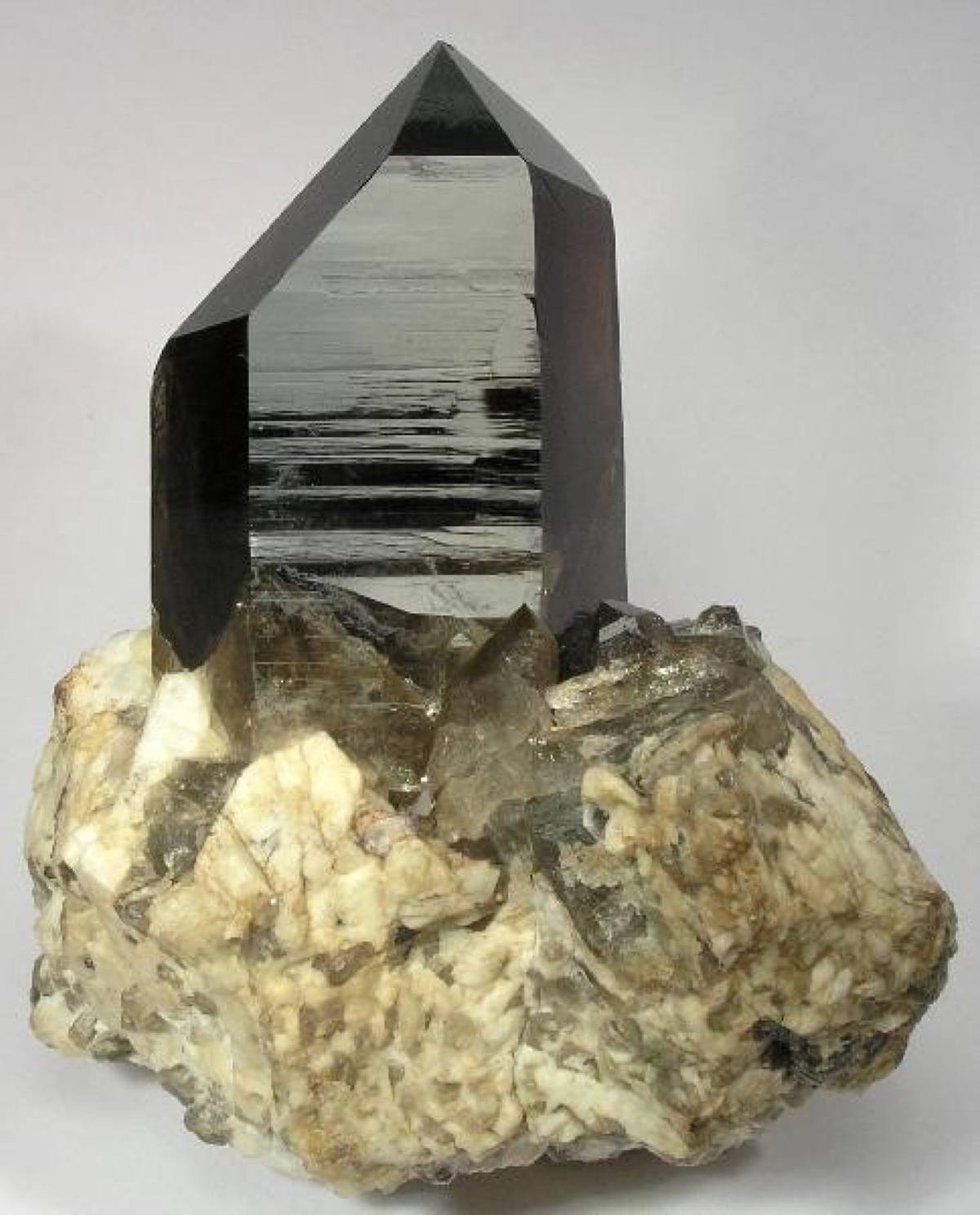 Smoky quartz prism on feldspar, Bartlett, New Hampshire