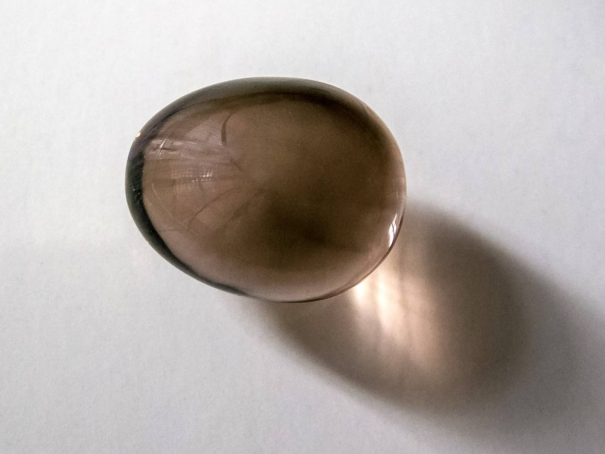 Polished smoky quartz showing transparent brown body colour