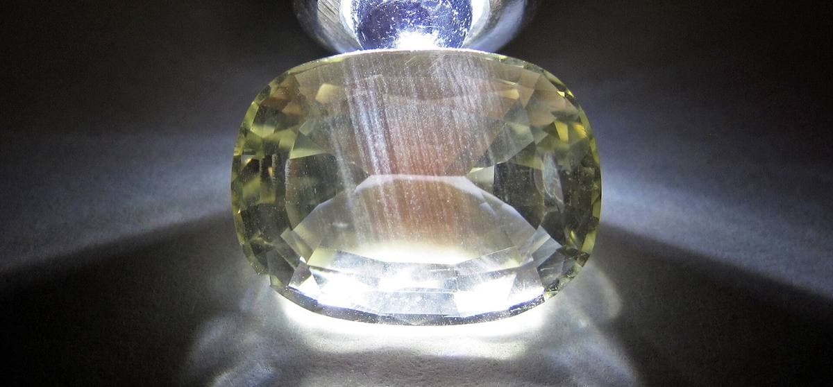 Pale yellow Oregon sunstone with a schiller band