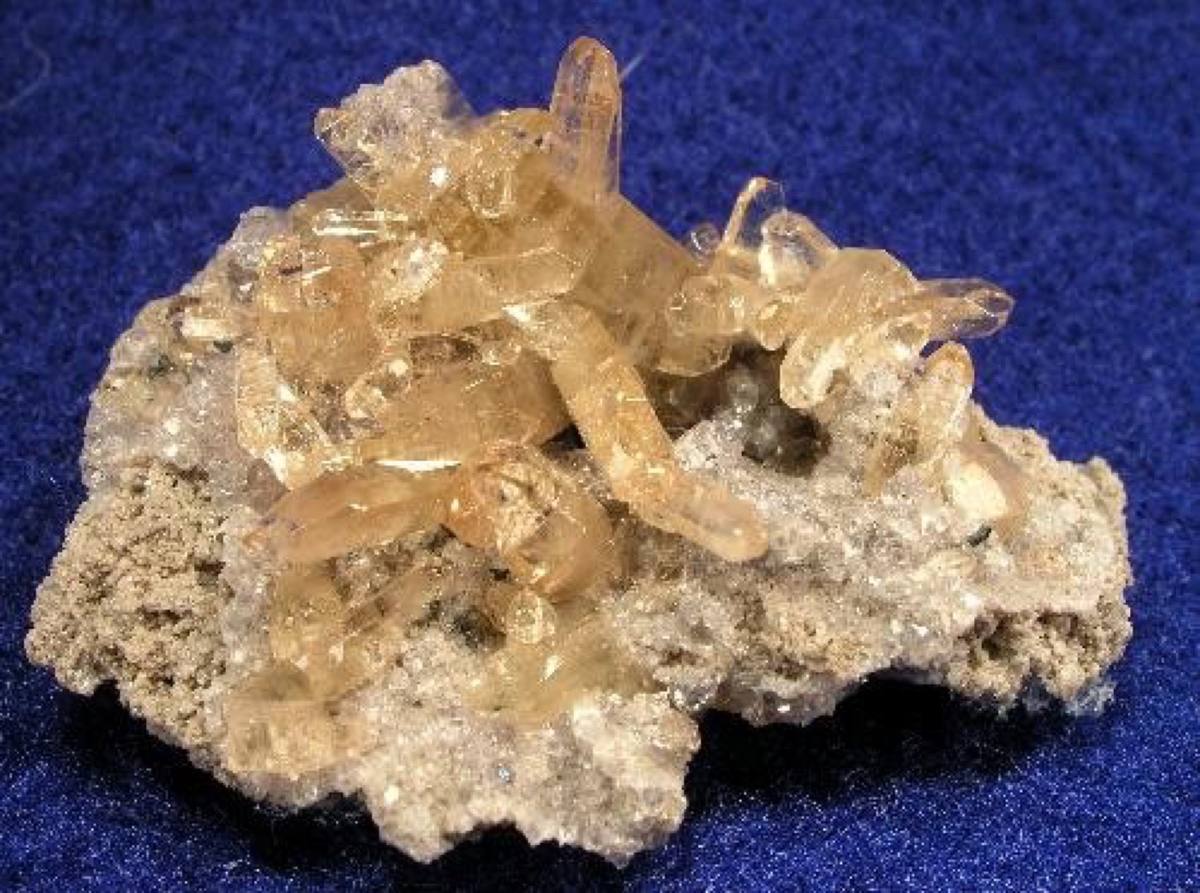 Colourless to champagne topaz cluster on rhyolite, Thomas Range, Utah