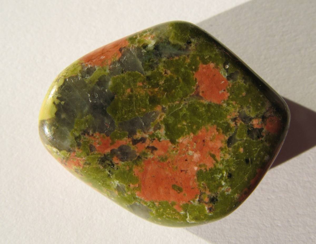 Polished unakite: salmon feldspar, olive epidote and grey quartz