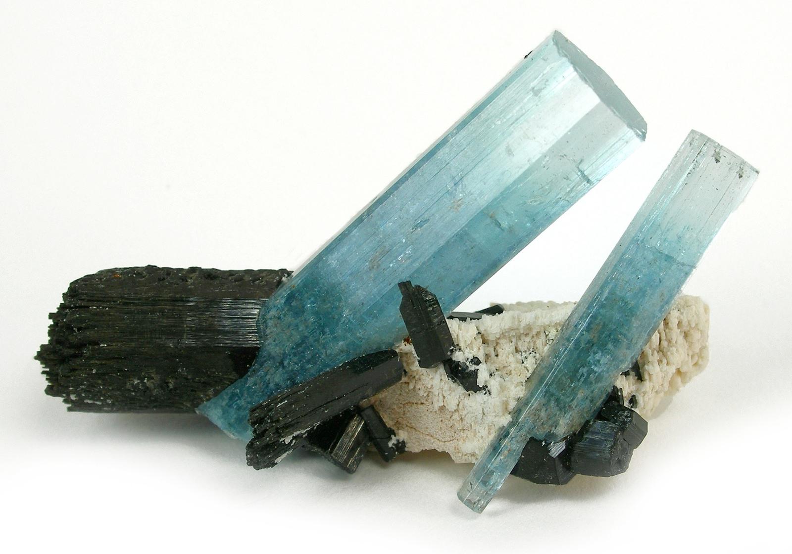 Aquamarine crystals with black schorl on feldspar, the gem beryl that makes Mount Antero famous