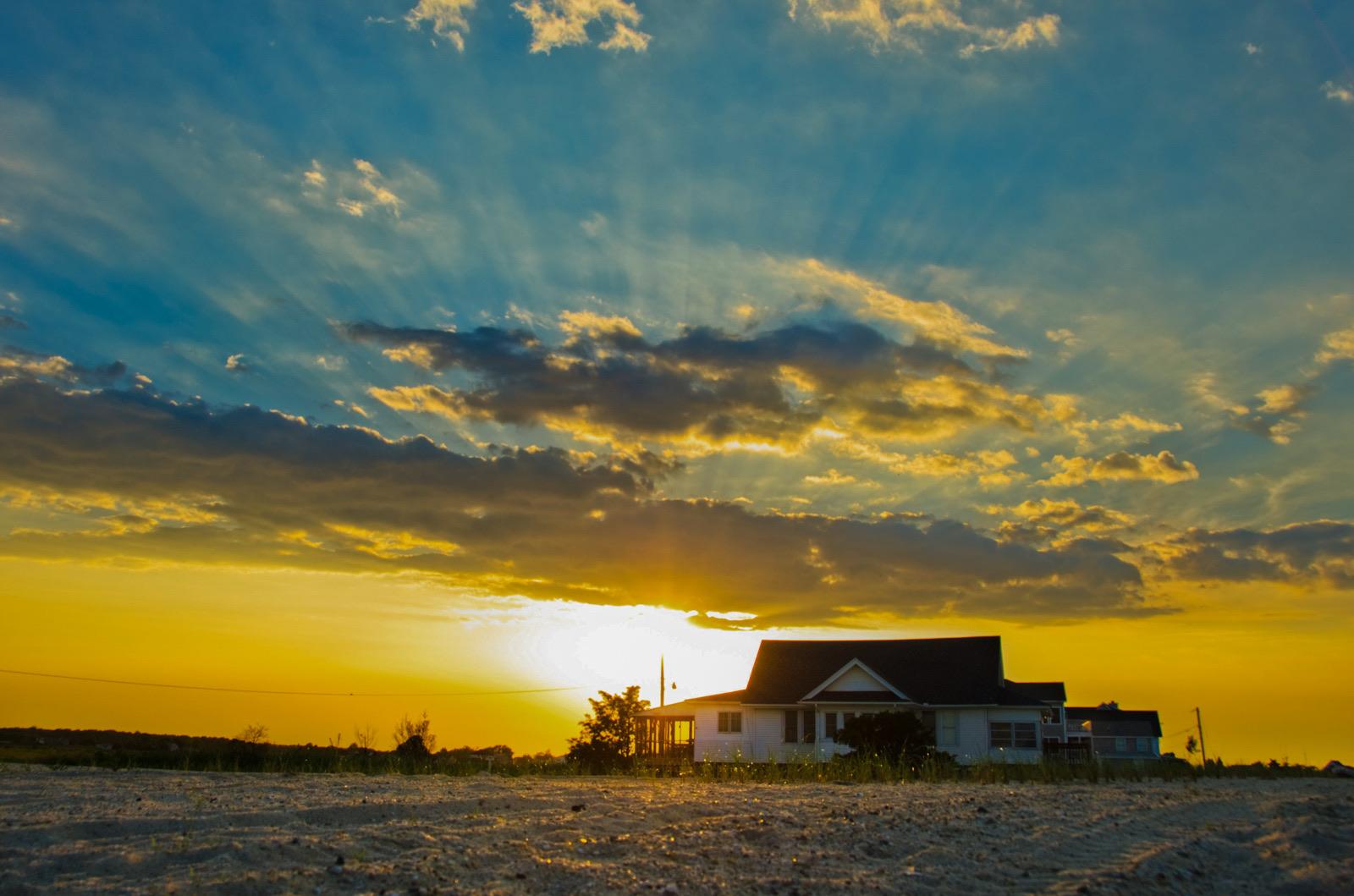 Evening light over the Delaware Bay beach at Bowers Beach, Kent County, Delaware, at the mouth of the Murderkill River.