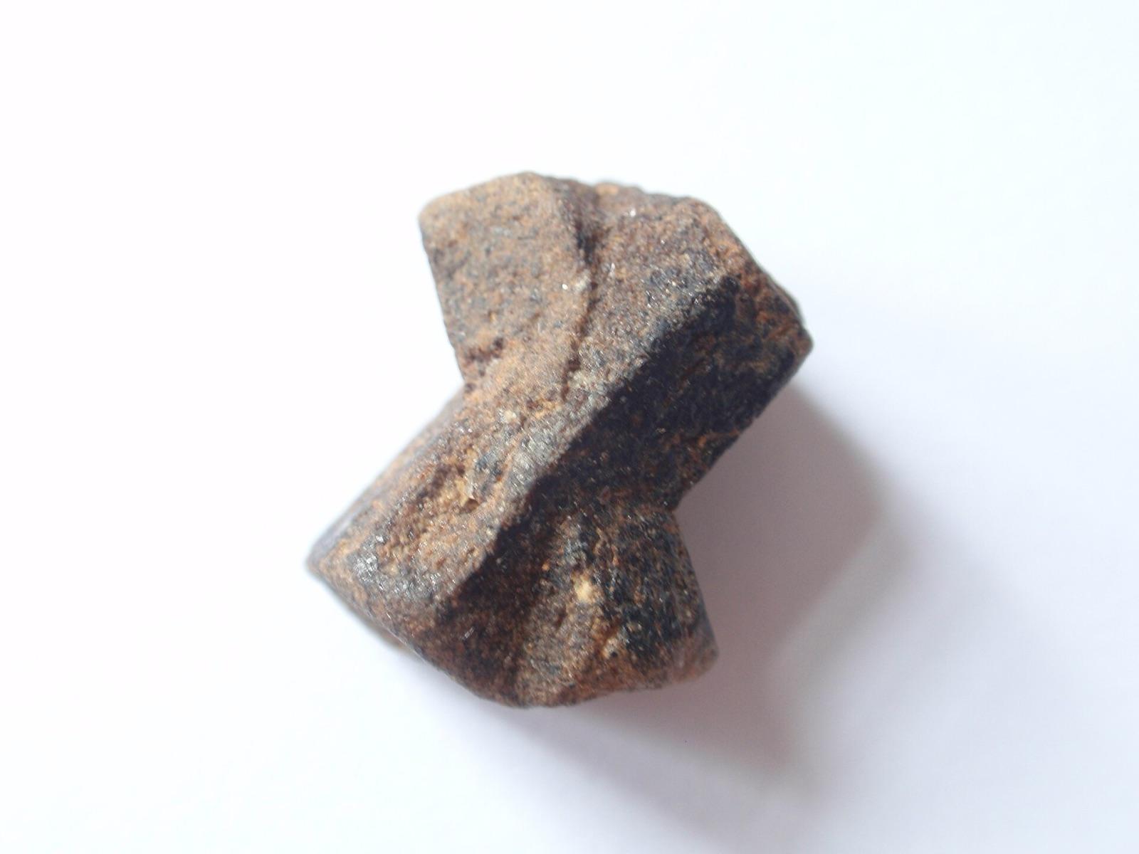 Cross-twinned staurolite crystal, the fairy cross form found in the mica schist around Mineral Bluff