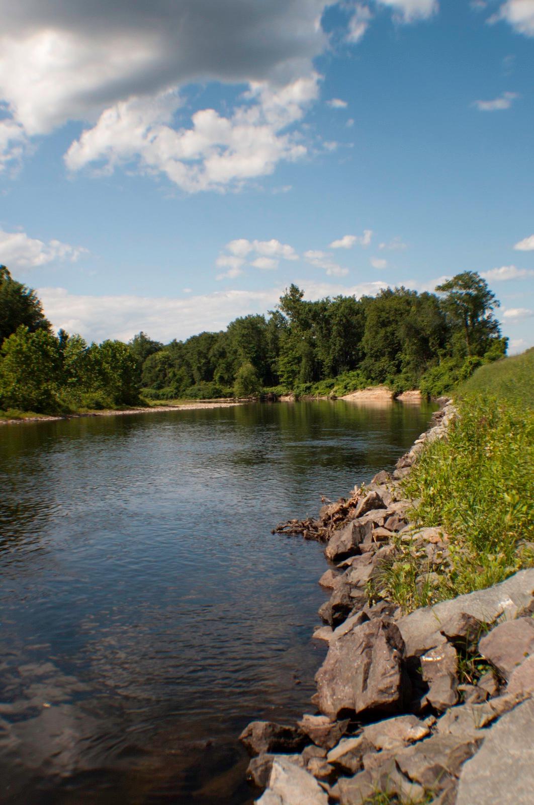 The Deerfield River bends past a rocky bank and gravel bar, Franklin County, Massachusetts