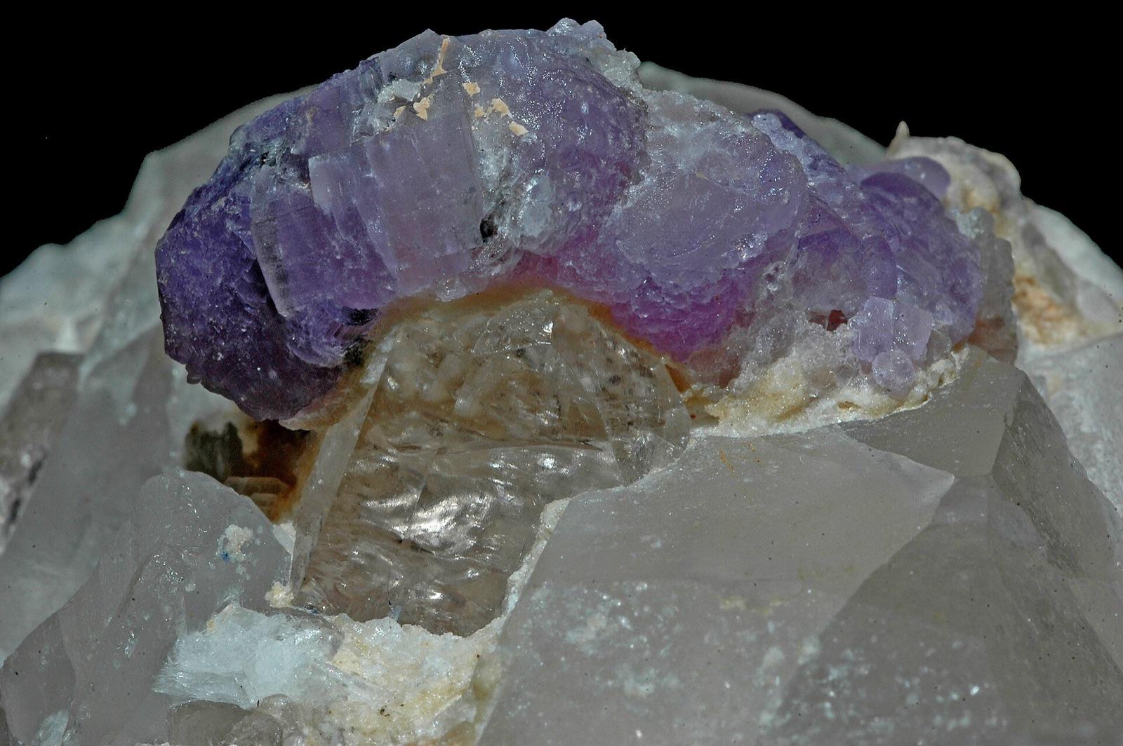 Violet purple apatite crystals on matrix, the gem that gives Mount Apatite its name