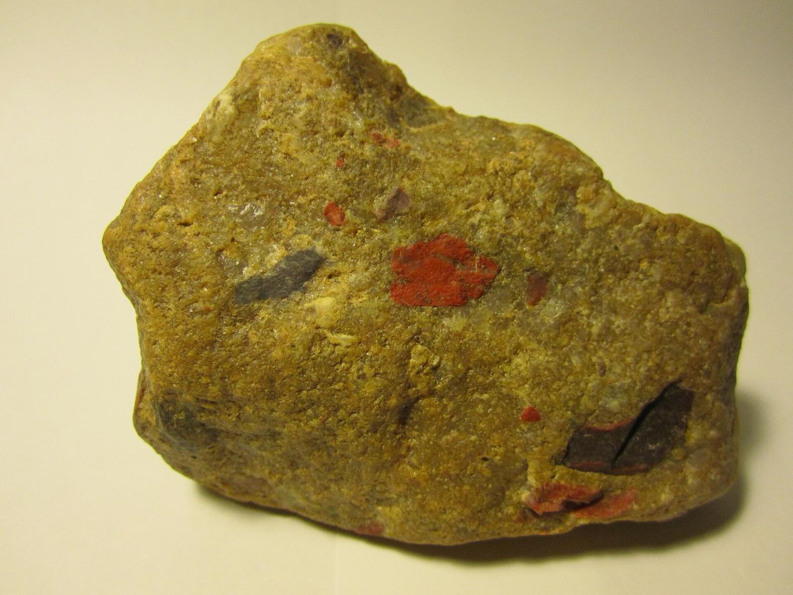 Pudding stone, red jasper pebbles set in white quartzite, like the puddingstones found on Drummond Island