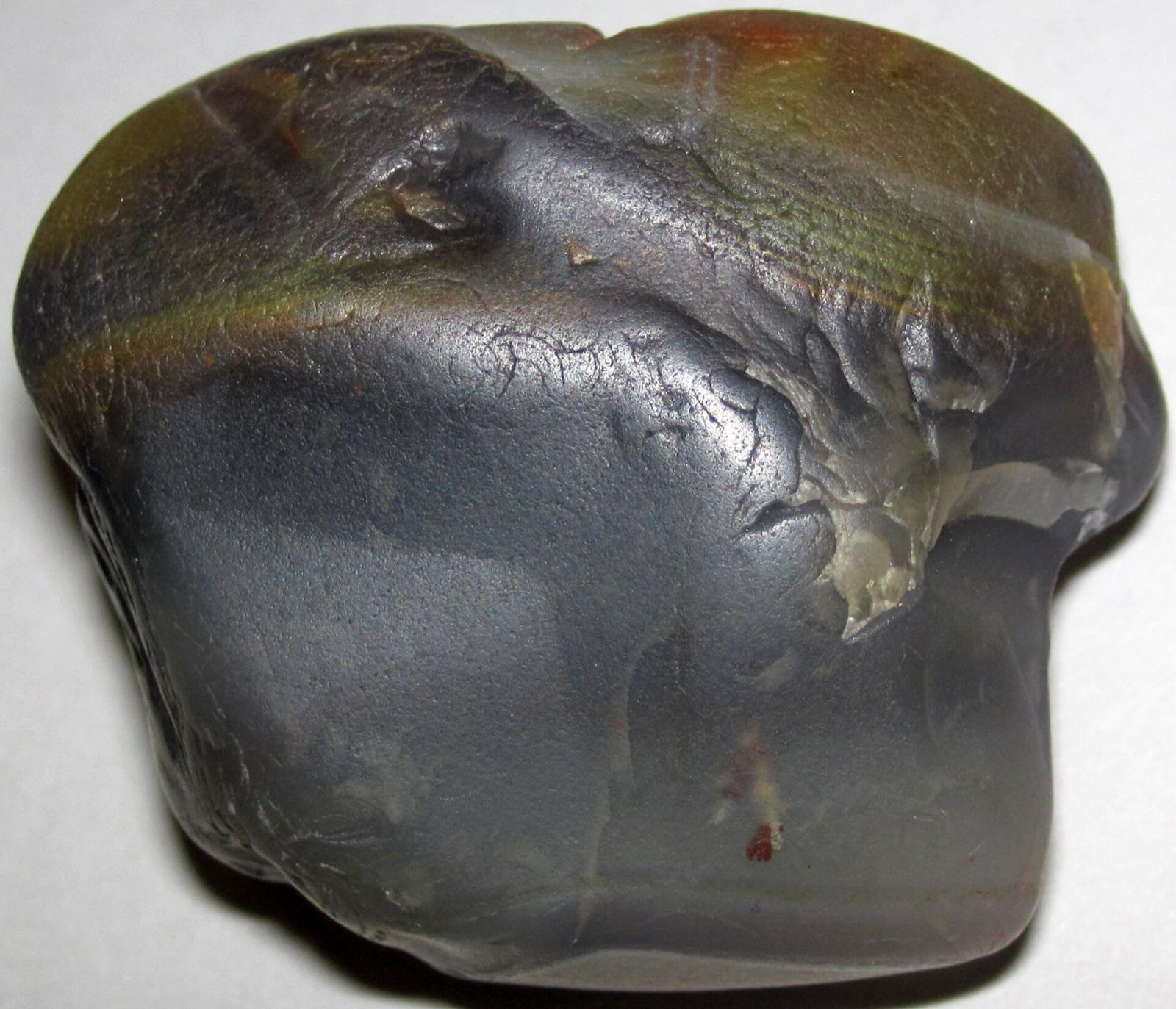 A beach-worn Lake Superior agate pebble from the Upper Peninsula shoreline