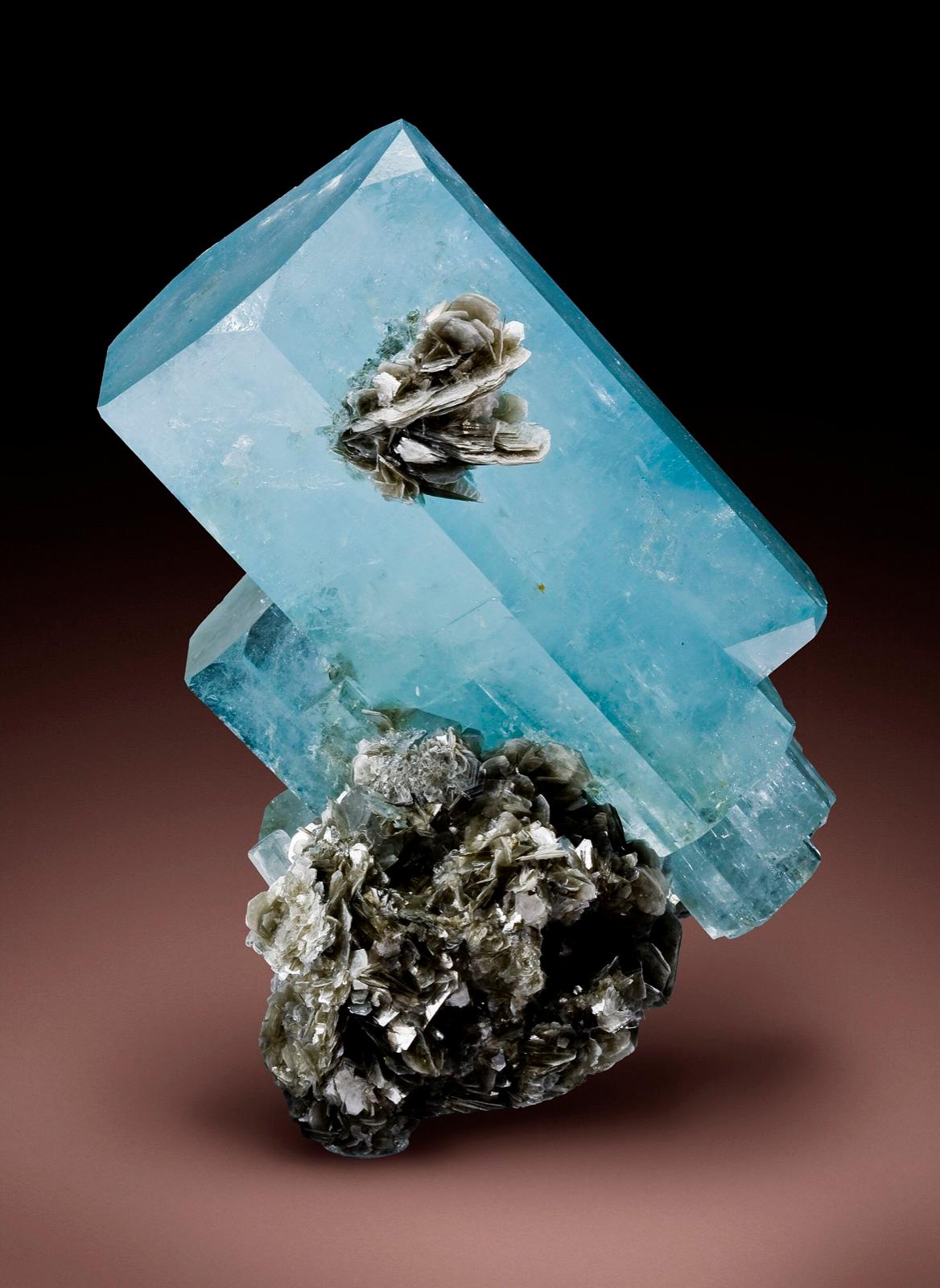 Gem-quality blue aquamarine (beryl) crystal on muscovite, a representative specimen of the signature mineral at Calvert Hill Mine, Beaverhead County, Montana