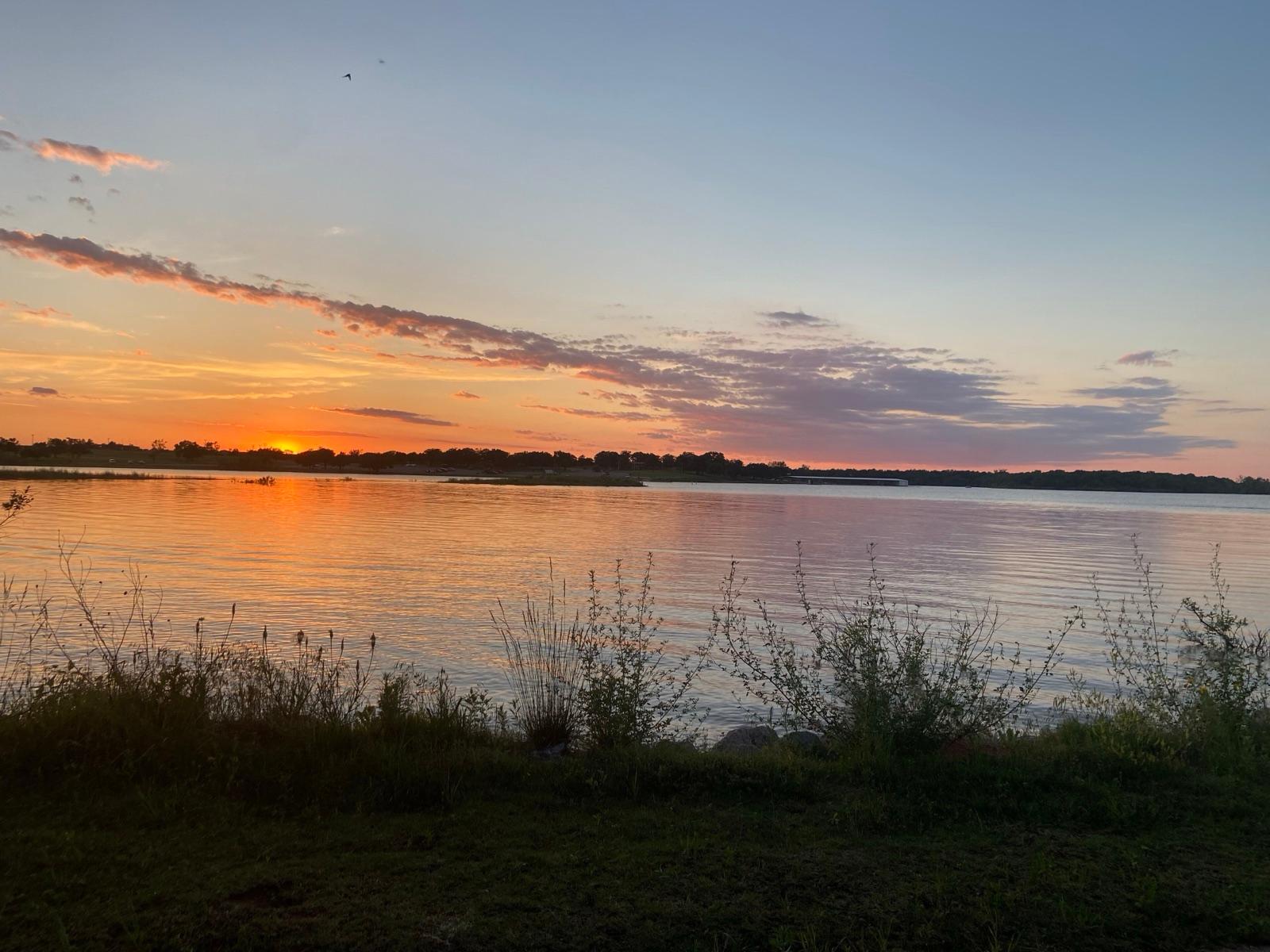 Sunset over the shoreline of Lake Stanley Draper near Oklahoma City, Oklahoma