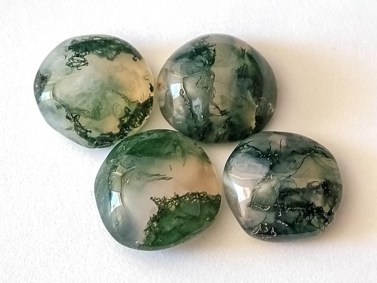 Polished moss agate cabochons with green dendritic inclusions, like the moss agate from the Washougal River